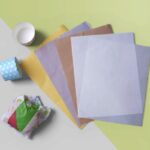 Oil-resistant greaseproof paper sheets